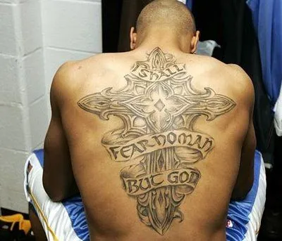 Kenyon Martin Cross tattoo